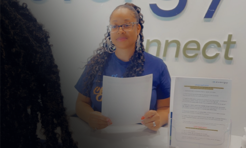 Evergy Connect Specialist helping a customer with an application for utility assistance