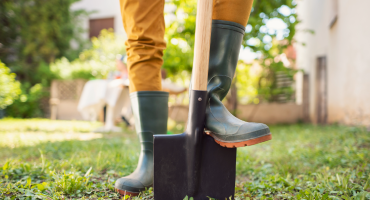 A person digging at home